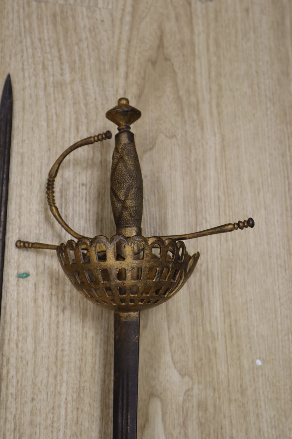 A pair of duelling swords, with cast hilts and 35 inch blades